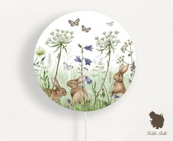 wandlamp rond in the undergrowth